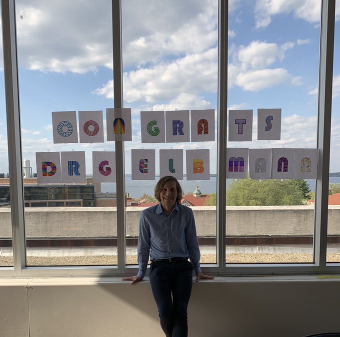 Chris celebrating his thesis defense