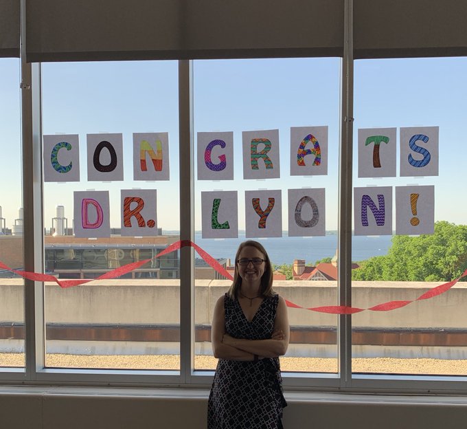 Shelby celebrating her thesis defense