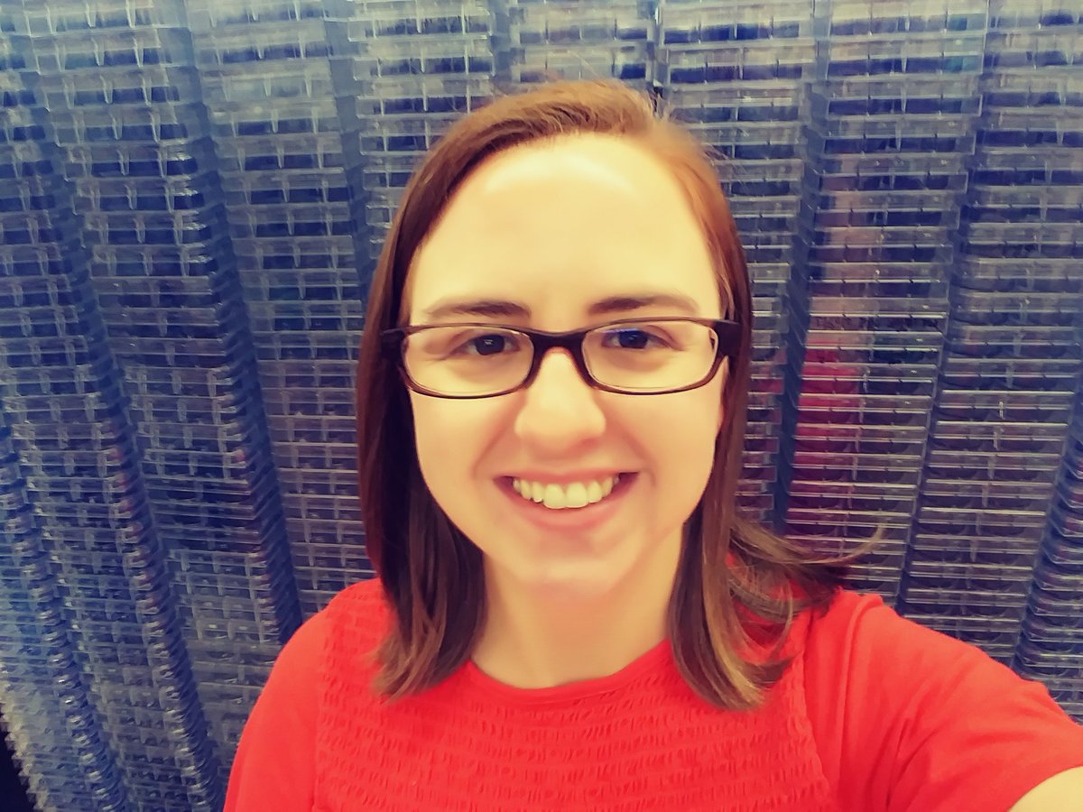 Shelby in front of her wall of plaque assays