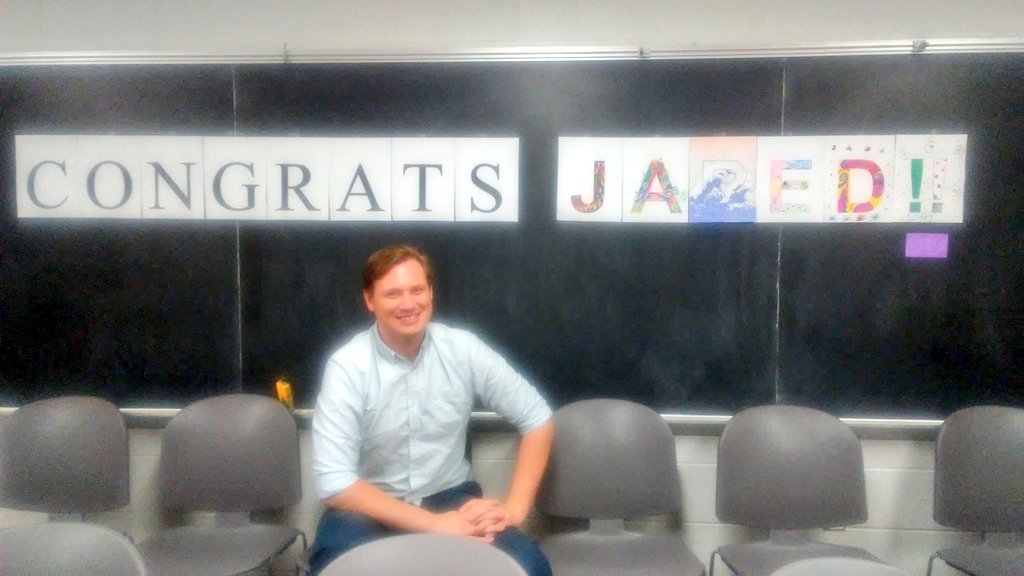 Jared celebrating passing his prelim exam