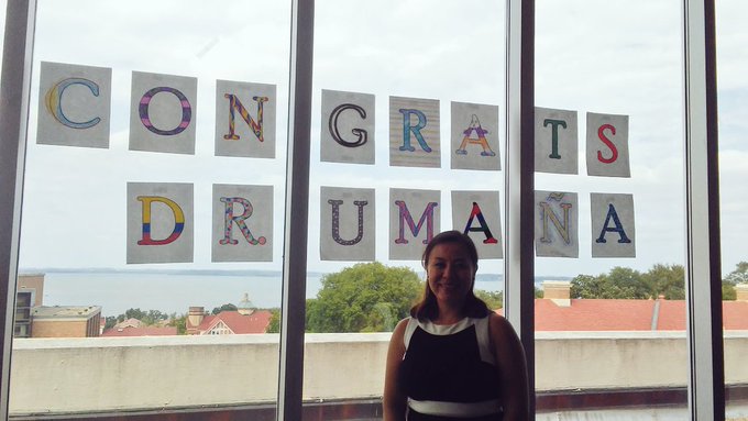 Angie celebrating her thesis defense