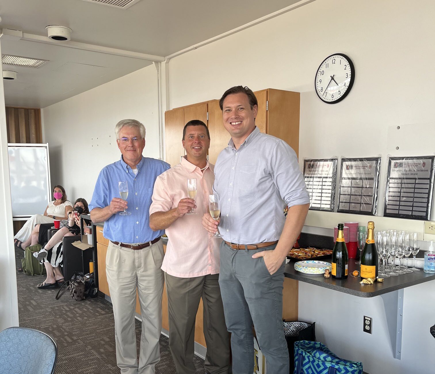 Paul, Rob, and Jared celebrating Jared's thesis defense