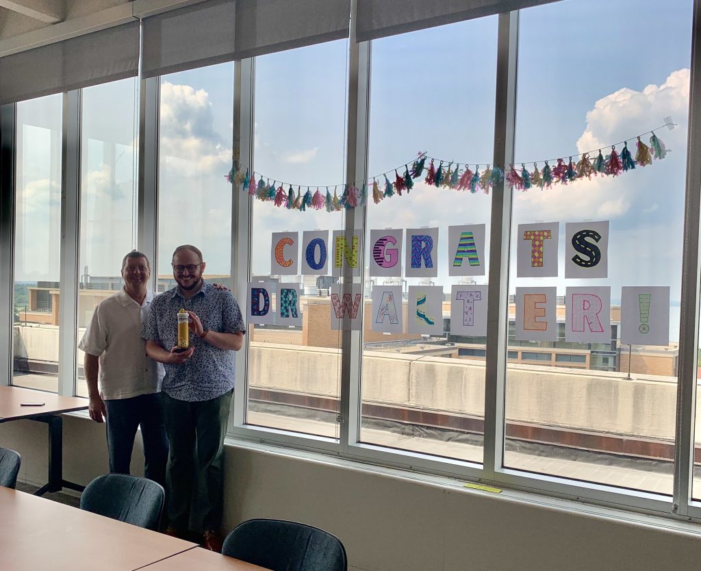 Rob and Ryan celebrating Ryan's thesis defense