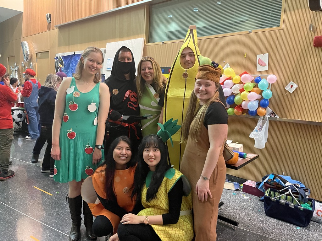 Group of virologists dressed as fruit ninja