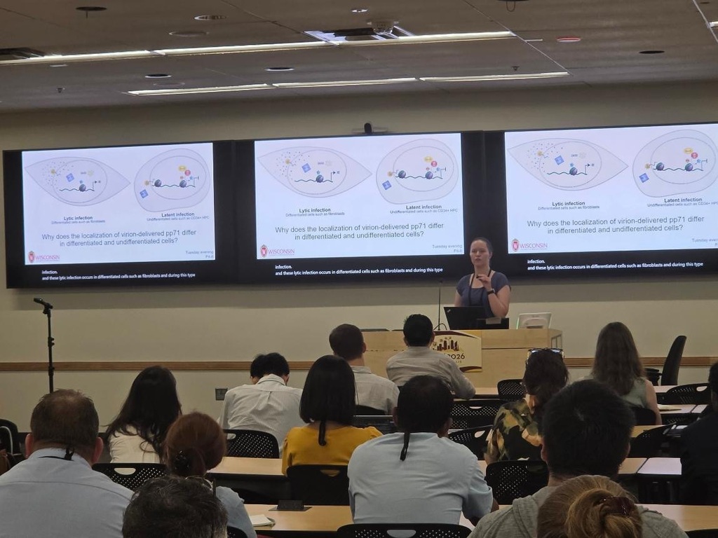 Esther presenting her research at ASV 2026