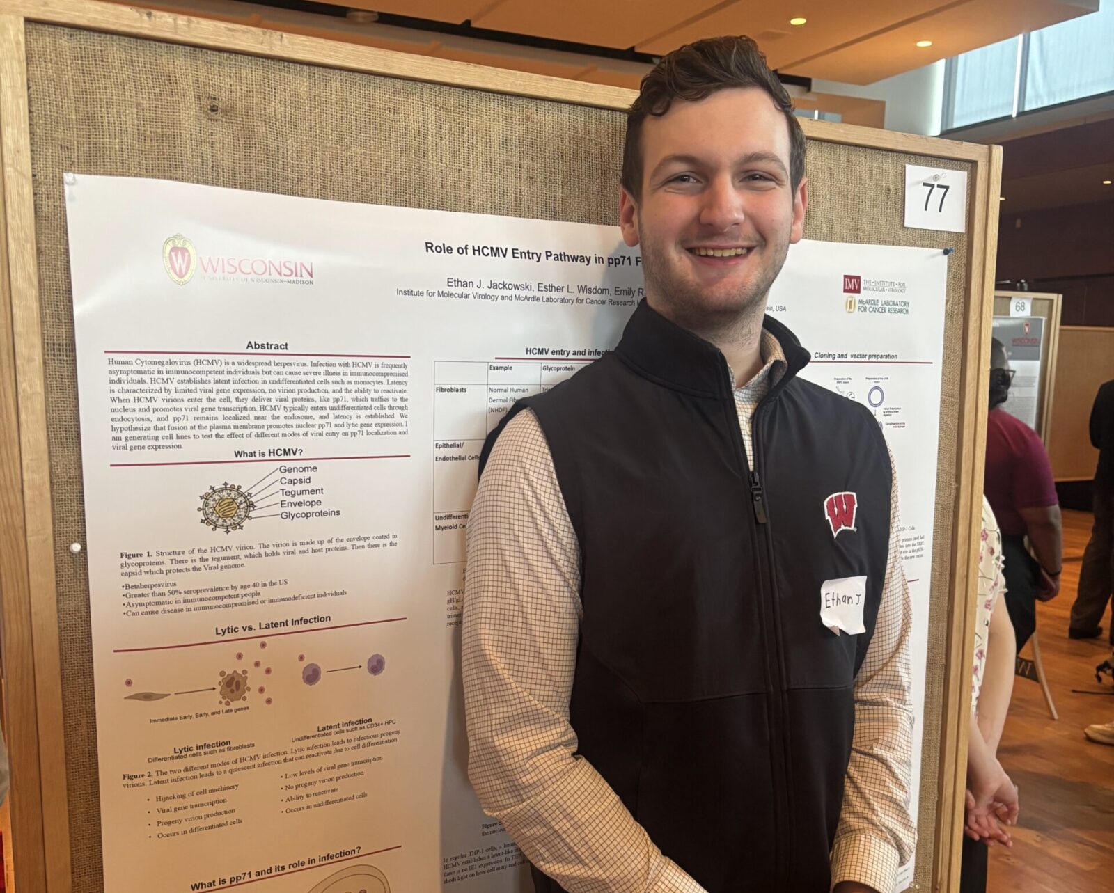 Ethan presenting a research poster at the UW Madison undergraduate research symposium